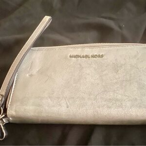 Micheal Kors silver metallic wristlet